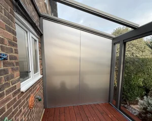 Frosted privacy window film installed on awning glass in London