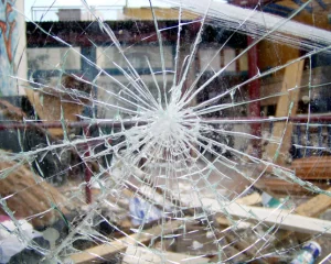 Close up of a smashed pane of glass