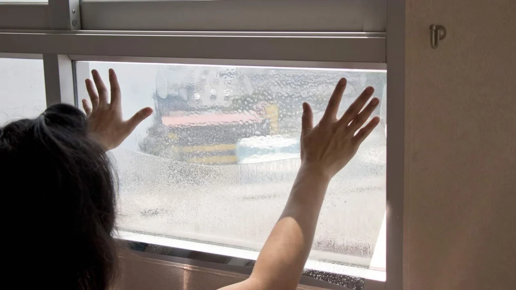 Someone installing self install Solar Control Window FIlm