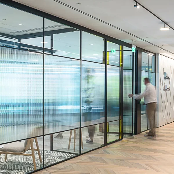 Commercial reeded window film placed on office partitions